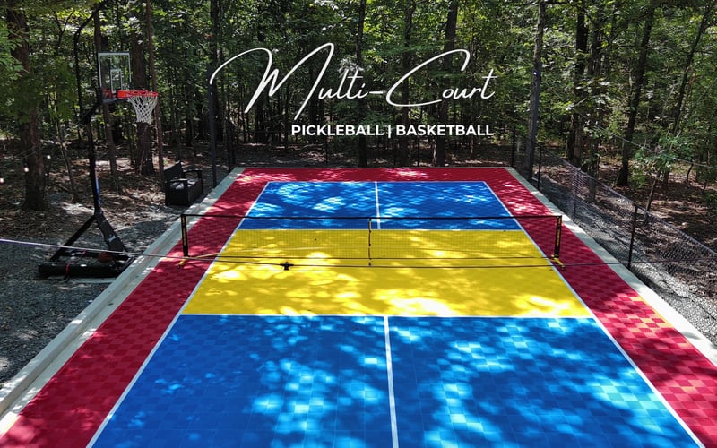 Rowdy Creek multi-court pickleball and basketball court in the woods.